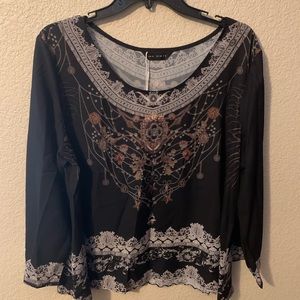 Blouse. Shear ‘silky’ fabric. Loose fitting.